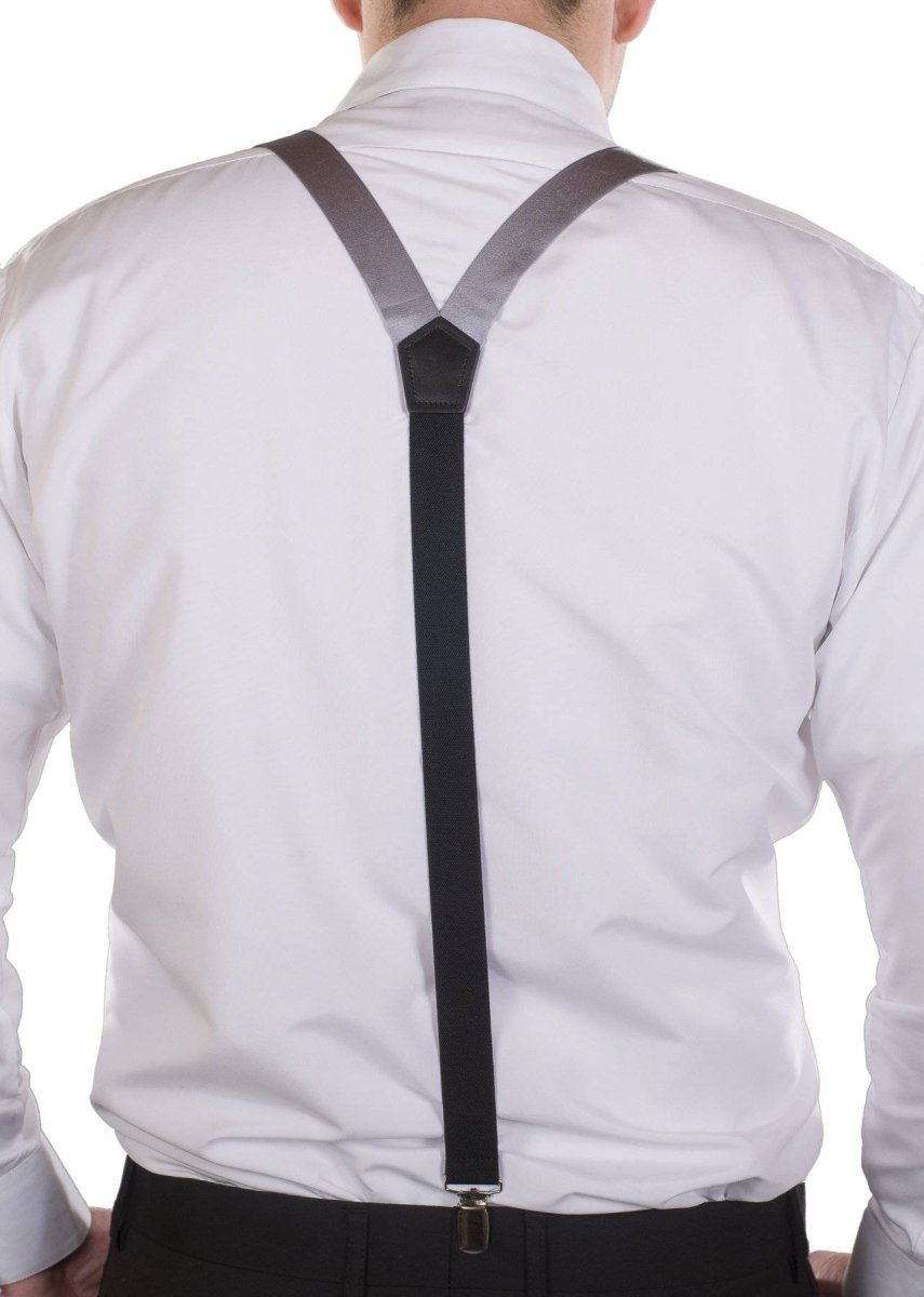 Formal Man In Shirt And Bow Tie Adjusting His Suspenders For A